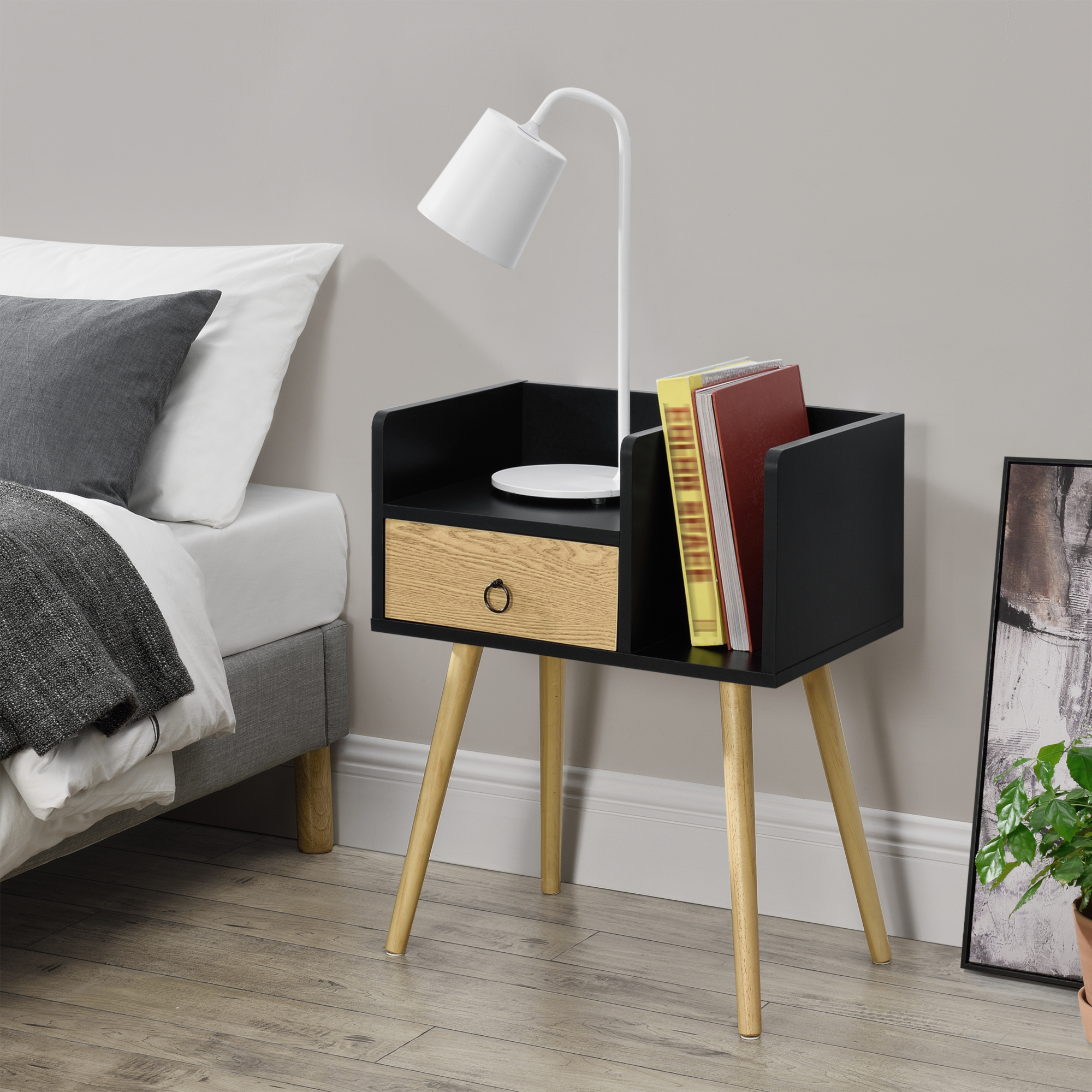 foto del prodotto  en.casa comodino gibbston con cassetto e 2 scomparti aperti 64x50x36 cm nero colore legno