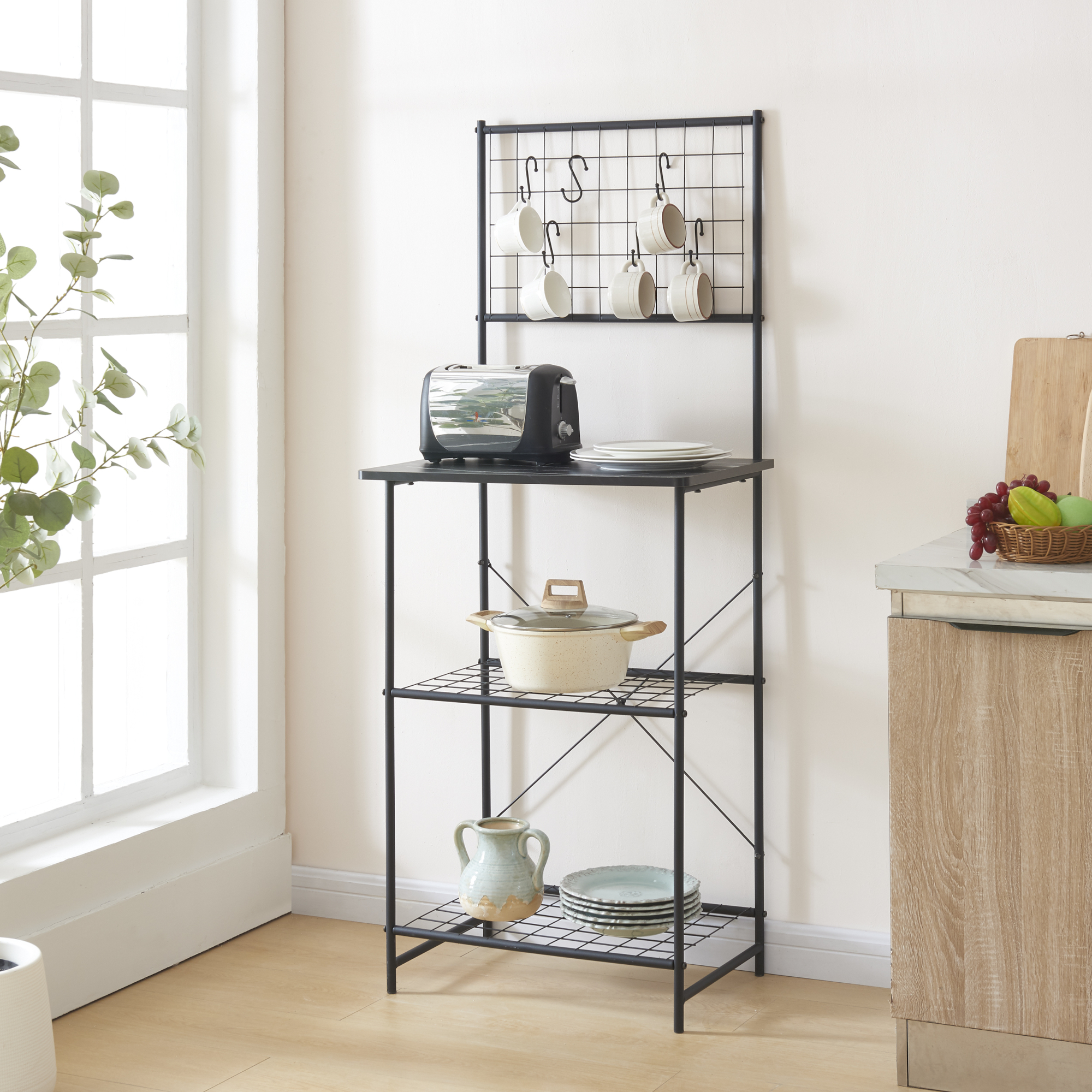 foto del prodotto  en.casa scaffale da cucina nibe mobile da stoccaggio supporto per microonde organizzatore da cucina con parete a griglia e ripiani nero 