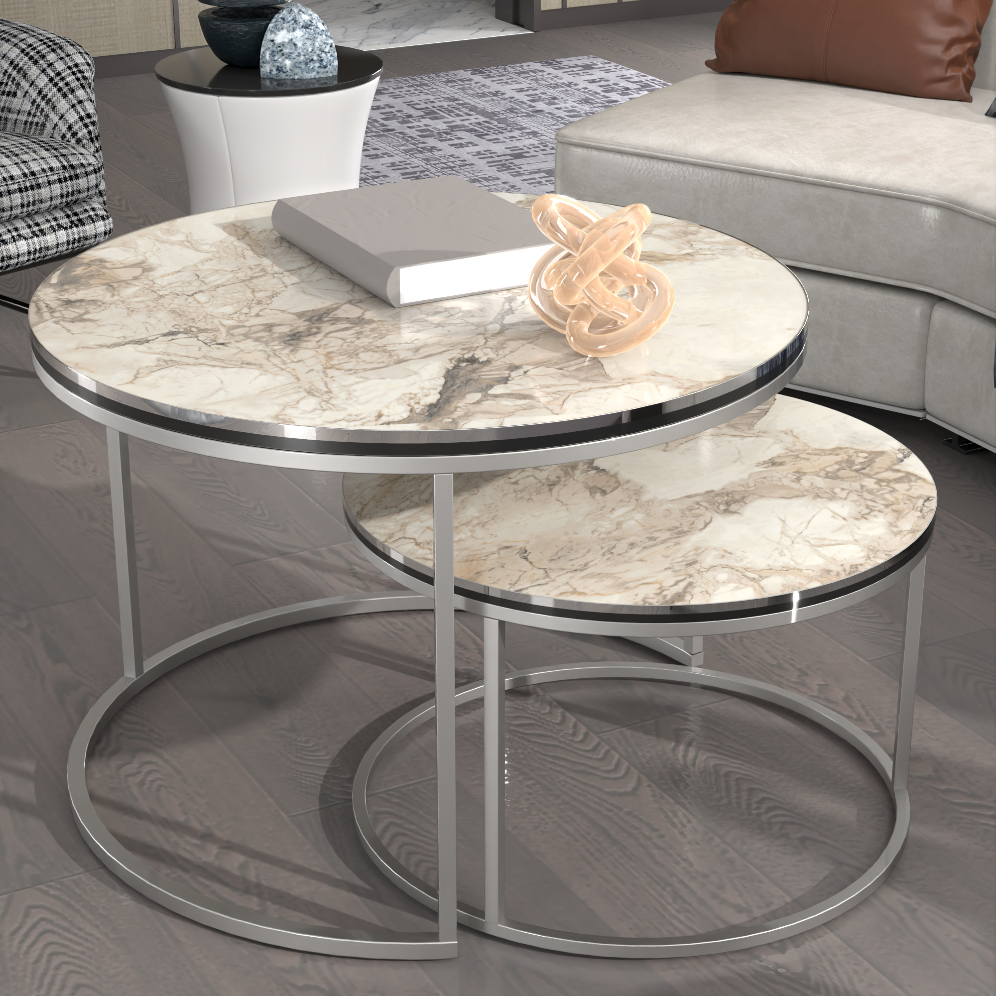 foto del prodotto  en.casa set skagen 2 tavolini sovrapponibili con piani rotondi e telaio in metallo effetto marmo bianco argentato