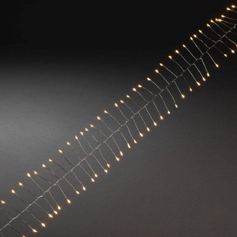 foto del prodotto 1465 890 catena luminosa con micro led, firecracker, con timer 6h, 60 diodi ambra, funzionamento a batteria, interno, filo argentato konstsmide