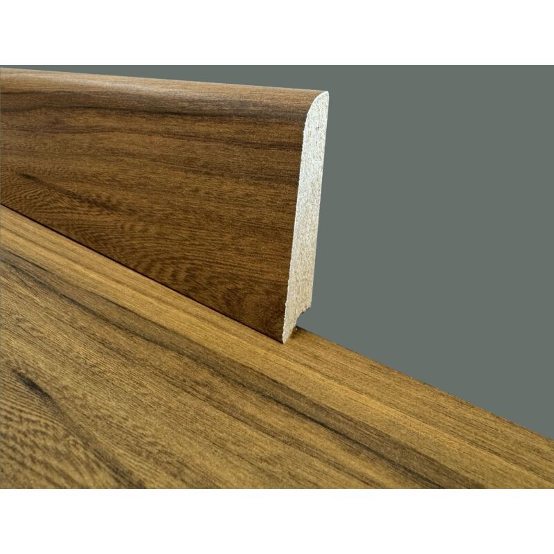 foto del prodotto 2,99ml battiscopa in fibra di legno coordinato gamma laminati 70x15 inclinato vari decori astana noce americano 