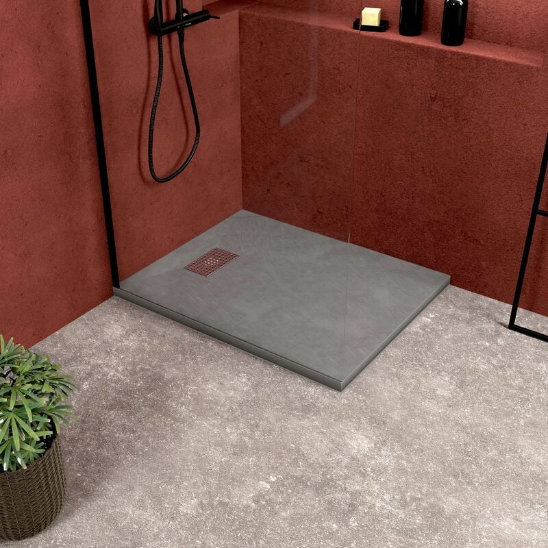 foto del prodotto piatto doccia grigio effetto pietra 70x90 cm e griglia motivo perforato in acciaio inox