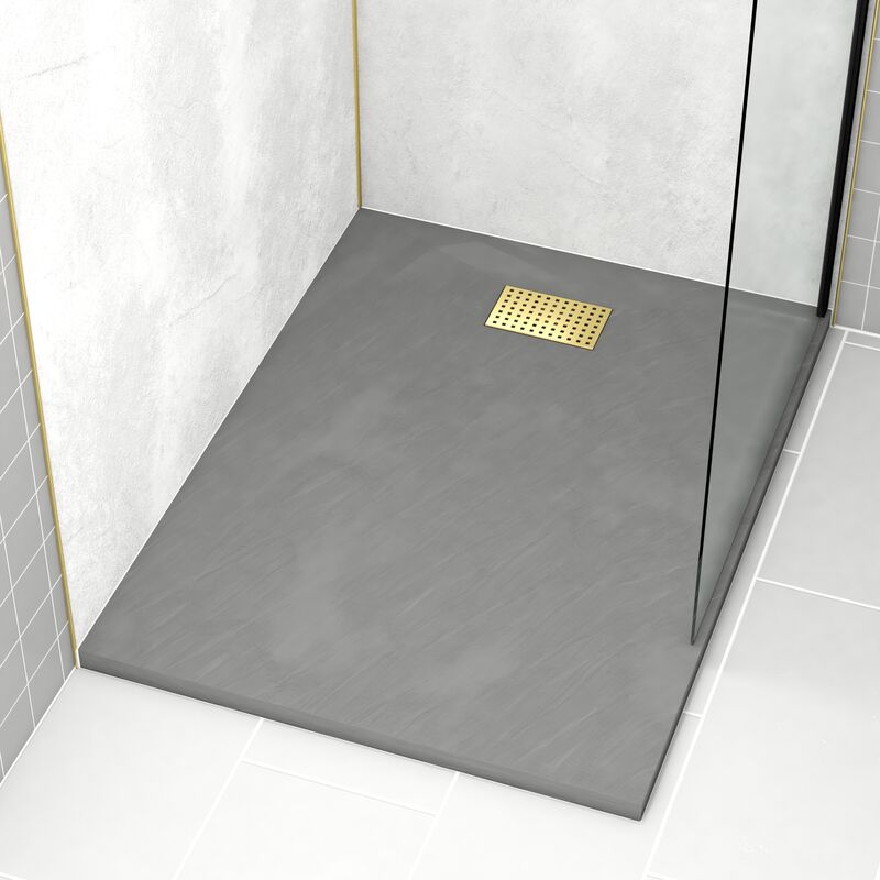 foto del prodotto piatto doccia grigio effetto pietra 90x120 cm e griglia motivo perforato oro spazzolato