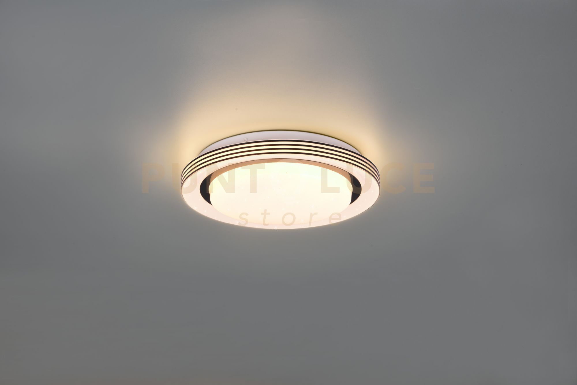 foto del prodotto atria plafoniera led 10,5w 1080lm, 3000 6000k bordo nero con telecomando multifunzione con diffusore effetto cielo stellato d.27cm dimmerabile