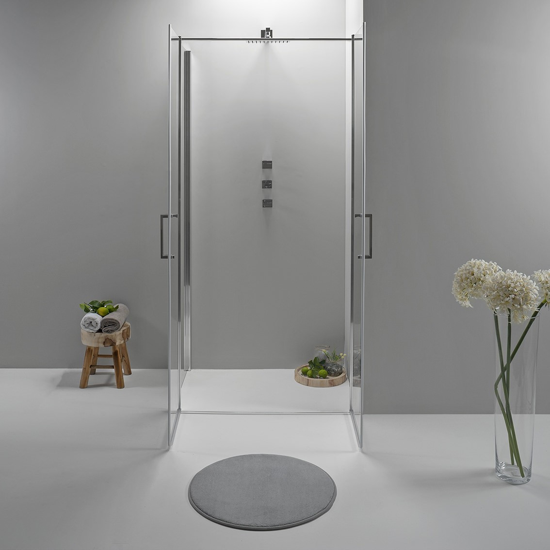 foto del prodotto box doccia angolare 80x70 cm apertura saloon con lato fisso trasparente