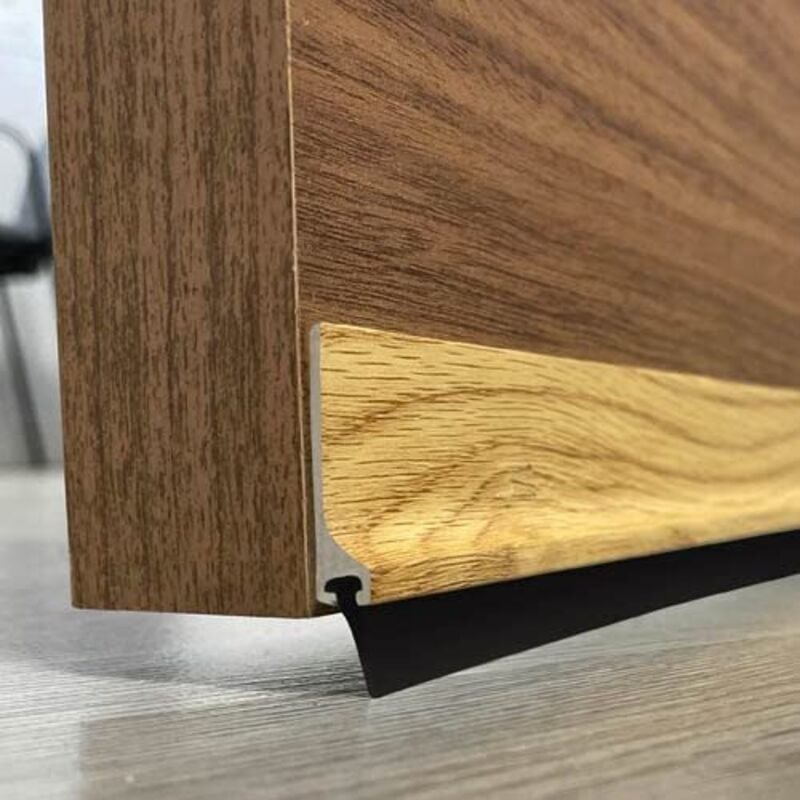 foto del prodotto burcasa paraspifferi per porta in pvc rigido rovere da 1 metro e frangia da 12 mm. fissaggio biadesivo resistente.