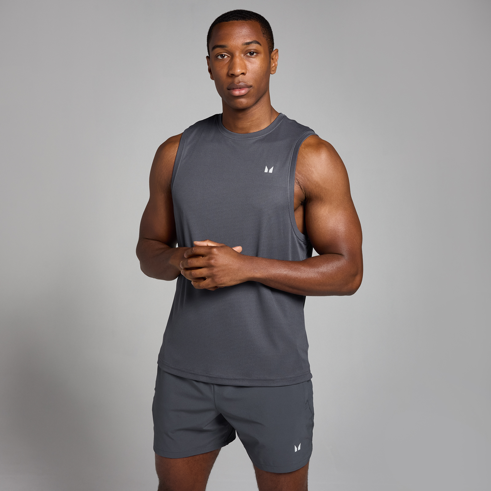 foto del prodotto canotta sportiva con trama a griglia mp active da uomo grigio scuro xs