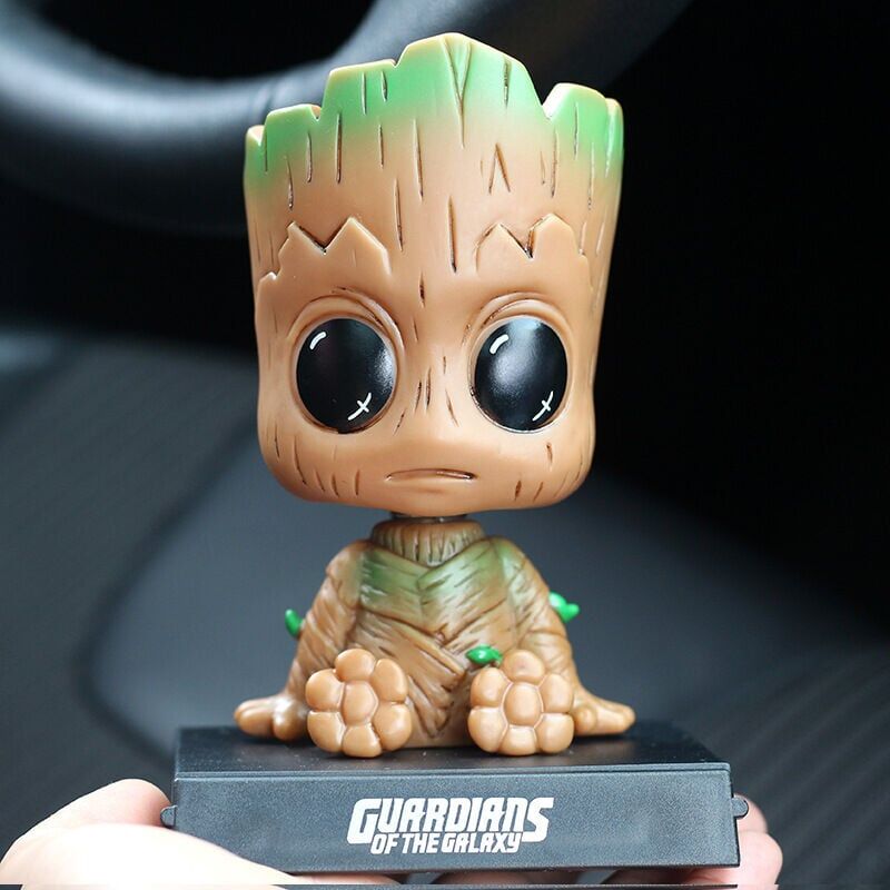 foto del prodotto cartoon groot cruscotto per auto figurina bobblehead cute anime groot accessori per auto