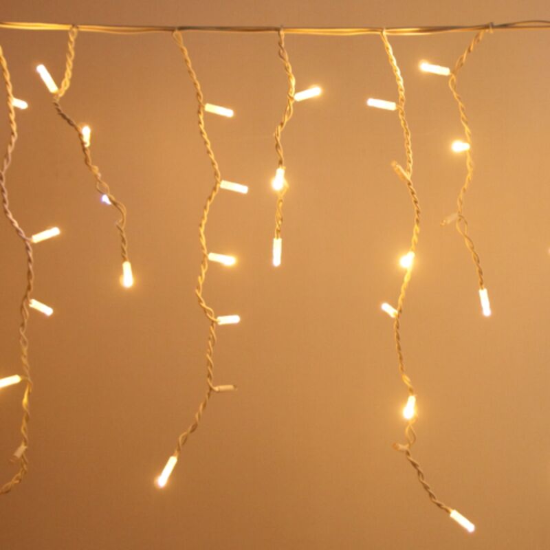 foto del prodotto cascata di stalattiti tenda a pioggia 4x0.70 mt con 200 luci di natale a maxi led bianco caldo con flash bianco ghiaccio ip65 professionale per