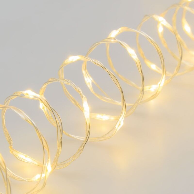 foto del prodotto catena 500 microled bobina 25m bianco caldo cavo trasparente argento