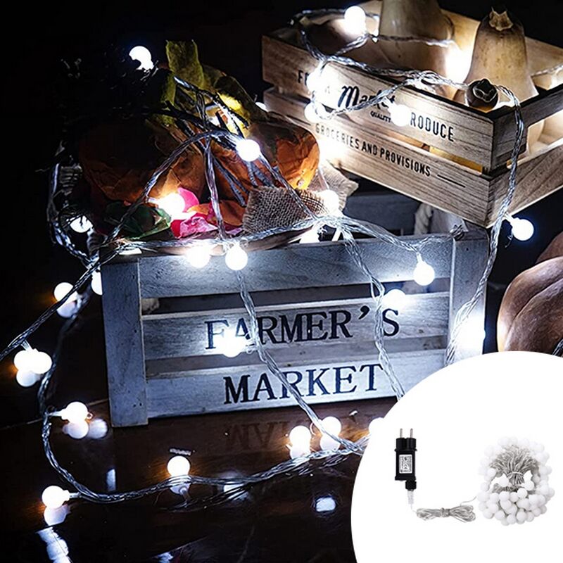 foto del prodotto catena decorata con 160 led a mini sfere luminose bianco freddo 16 metri con cavo trasparente wisdom