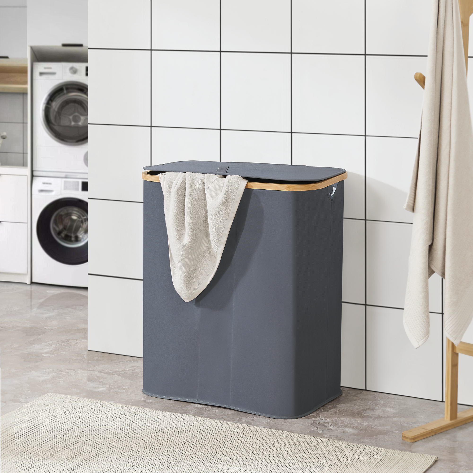 foto del prodotto cesto portabiancheria rusko con coperchio e 3 sacchi grigio scuro en.casa 