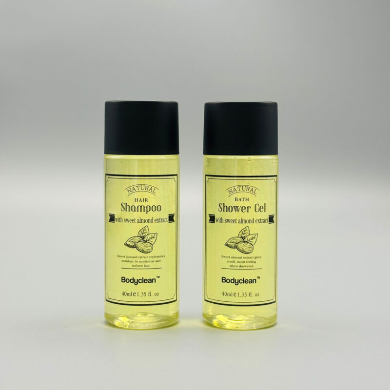 foto del prodotto confezione da 100 flaconi di bodyclean shampoo 30 ml fragranza arancia amara