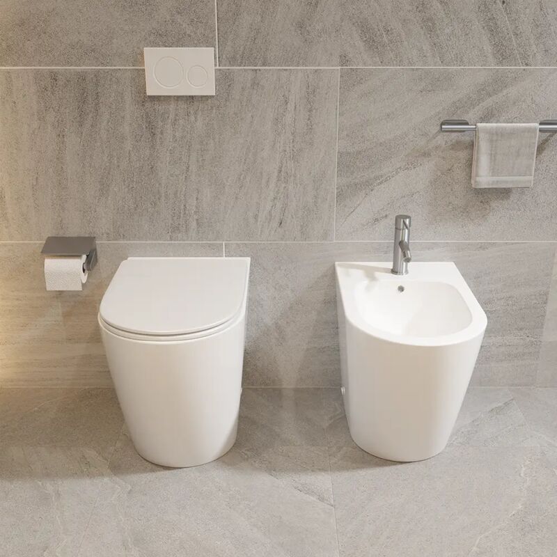 foto del prodotto coppia di sanitari filomuro comfort in ceramica bianco lucido vaso rimless h44,5 cm con copriwc soft close e bidet mod. europa