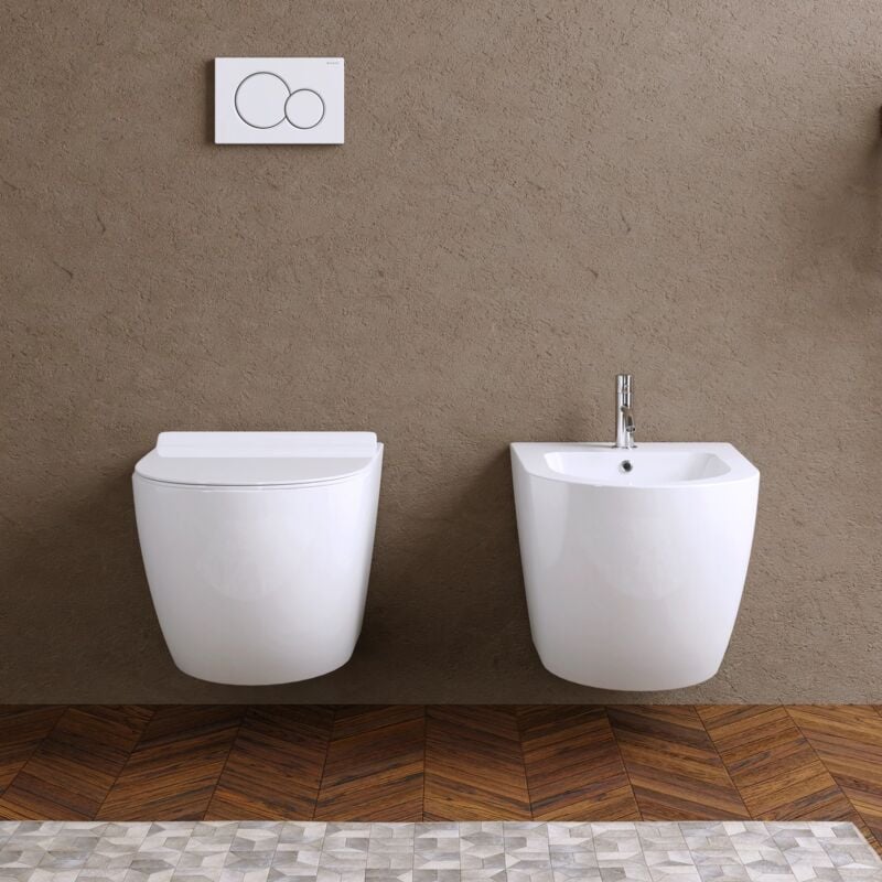 foto del prodotto coppia di sanitari sospesi in ceramica bianco lucido rimless vaso, sedile con chiusura rallentata e bidet mod. parigi