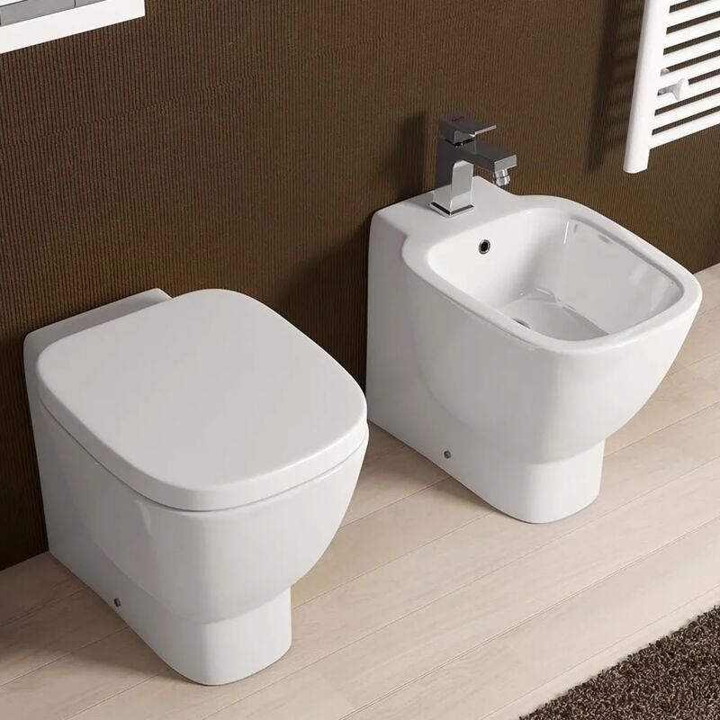 foto del prodotto coppia sanitari filomuro rak serie one in ceramica con sedile avvolgente
