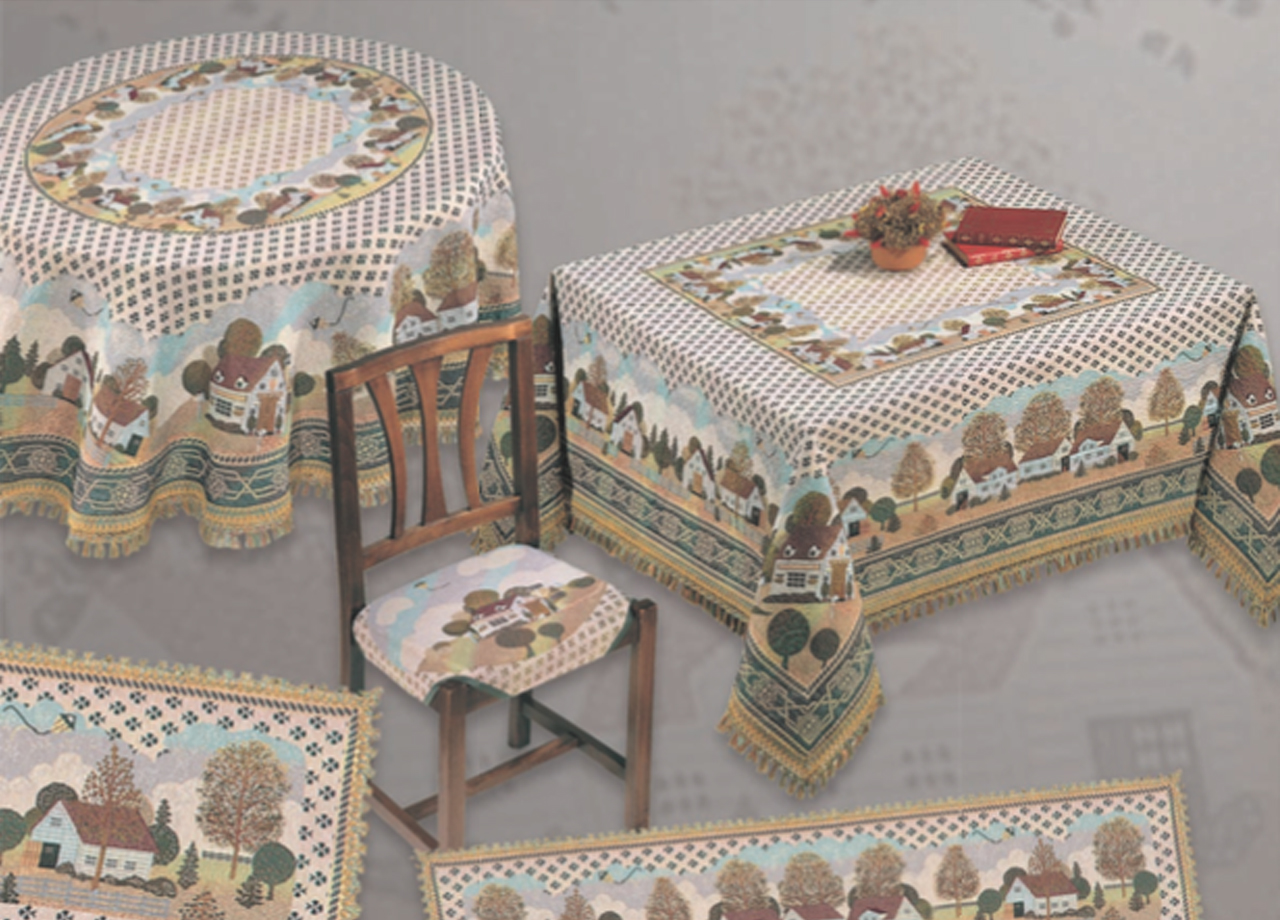 foto del prodotto copritavolo jacquard disegno casette by suardi 150x180 casette