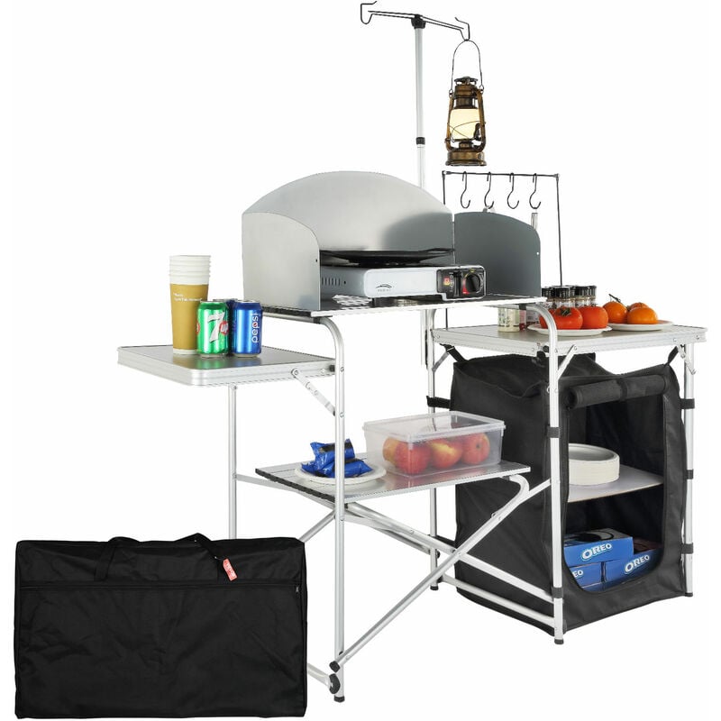 foto del prodotto cucina da campeggio per cottura pieghevole portatile con parabrezza a 3 lati materiale in alluminio ferro mdf dimensioni estese 146x46x168 cm, tavolo