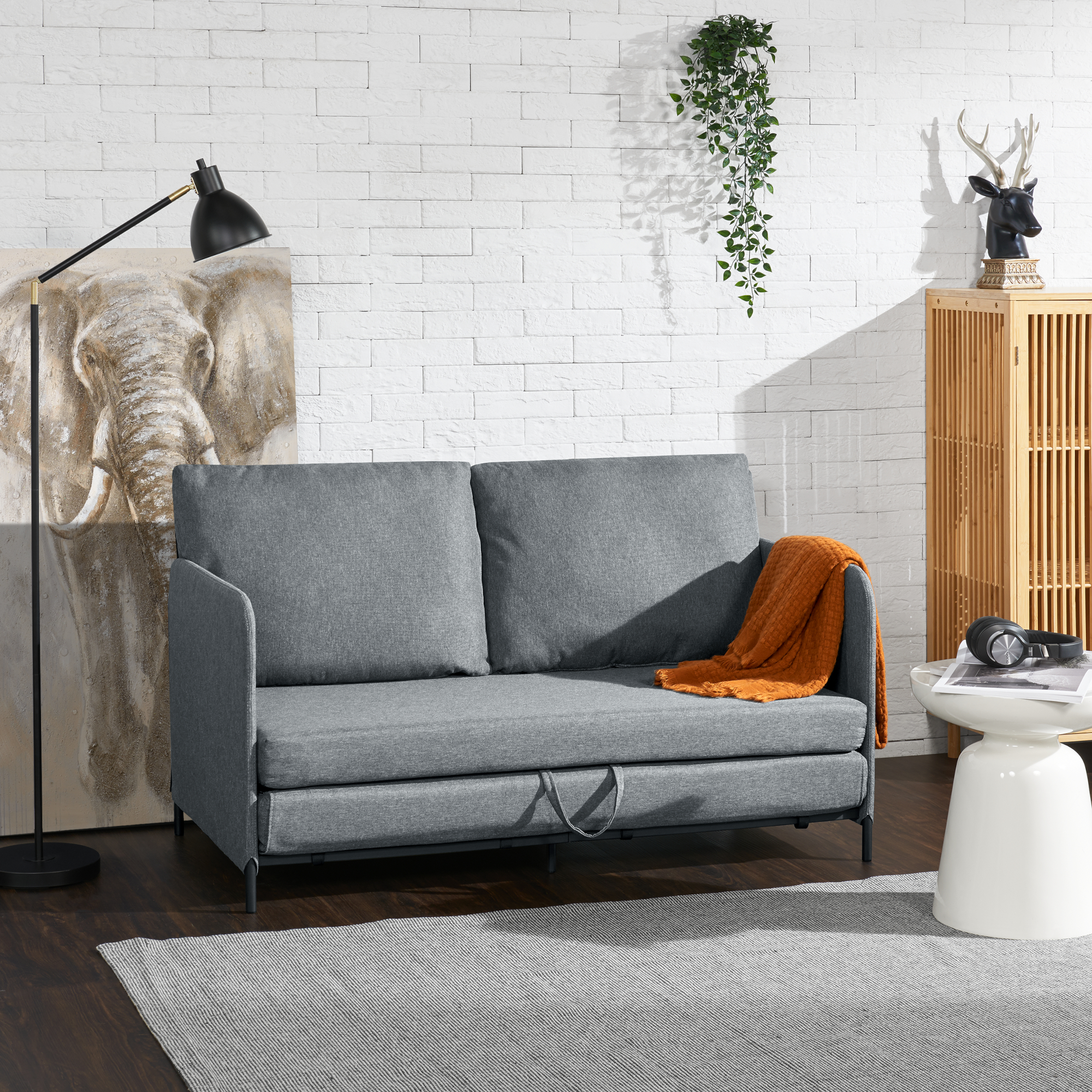 foto del prodotto divano letto estensibile soini 1 piazza e mezza 120 x 186 cm grigio scuro en.casa 