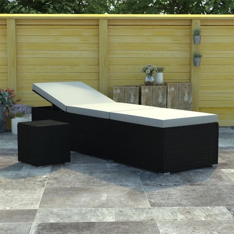 foto del prodotto elegante lettino prendisole con cuscini e tavolo laterale vari colori colore nero e bianco