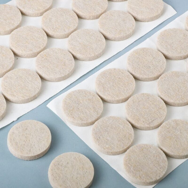 foto del prodotto feltrini autoadesivi ymyny 54 pezzi, 5 mm di spessore, feltrini per sedie, cuscini di protezione per gambe di sedie, tavoli, mobili, protezione per pavimenti (rotondi, 27 mm, beige)