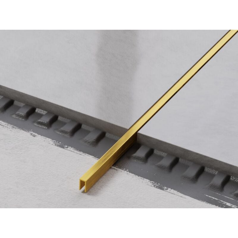 foto del prodotto ilcom profilo u di raccordo rettificato in acciaio inossidabile 0.5cm x 244cm oro satinato