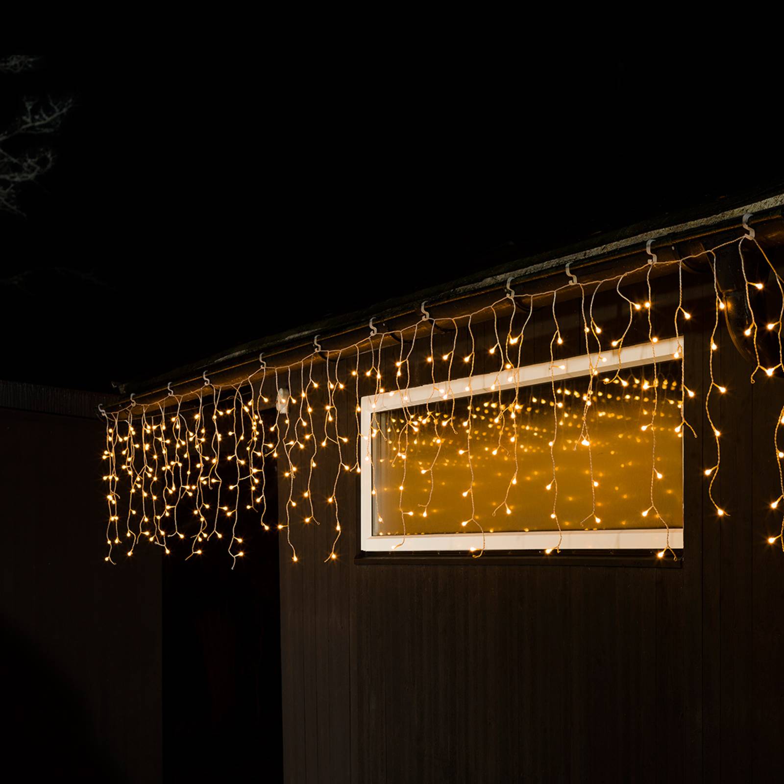 foto del prodotto konstsmide christmas tenda led pioggia bianco caldo trasparente 5m