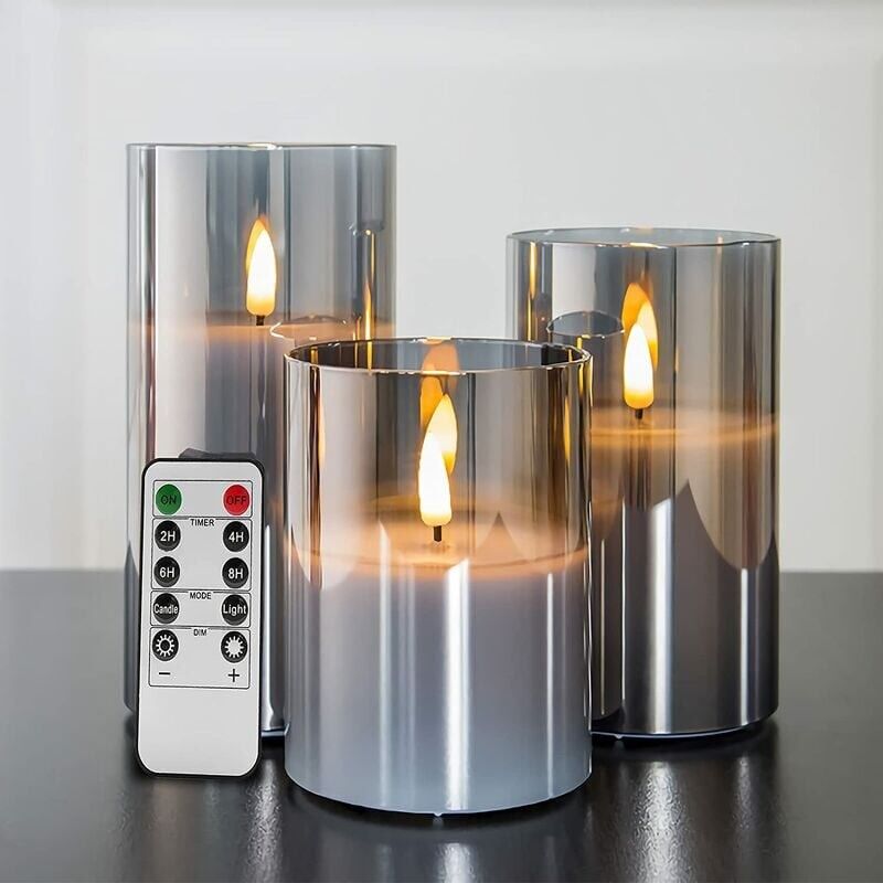 foto del prodotto kzq candele tremolanti senza fiamma in vetro grigio argento con telecomando, confezione da 3 candele led finte realistiche 3 ore 4 5 6