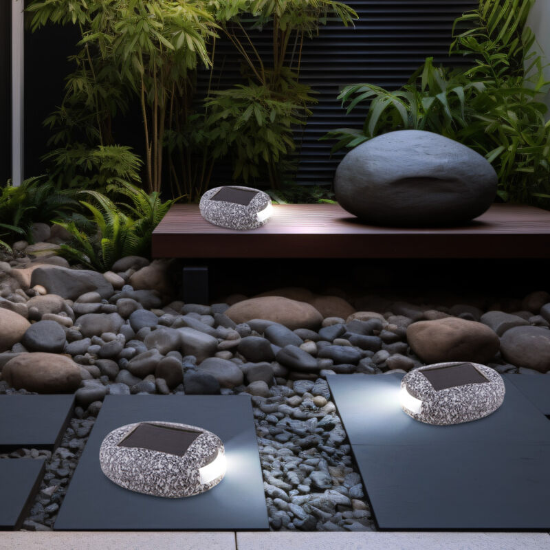 foto del prodotto lampada da esterno a led a luce solare, design in pietra, pietre solari, lampada da giardino, plastica grigia, batteria ip44, l 8,5 cm, set da 3