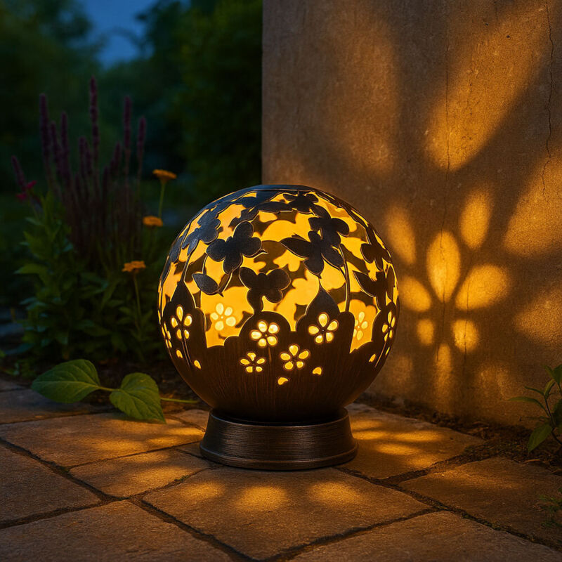 foto del prodotto lampada da esterno, luce solare, lampada a sfera, da appoggio, metallo nero, perforazioni decorative, led bianco caldo, rotondo, h 21cm nino 59080108