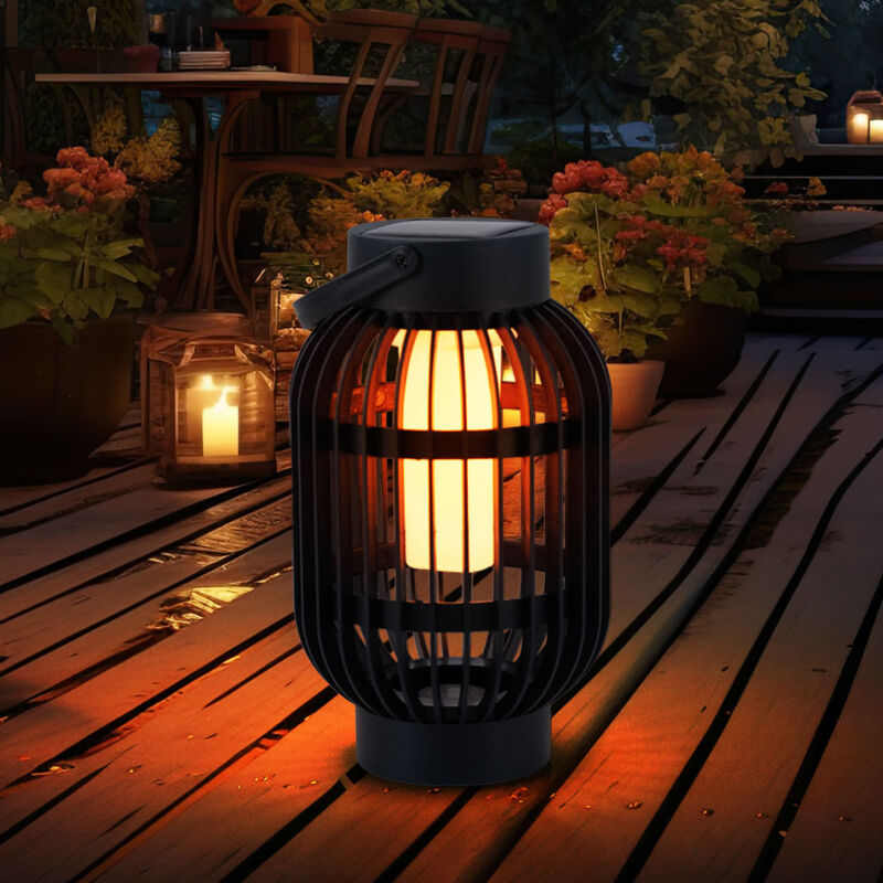 foto del prodotto lampada da tavolo a luce solare led effetto fiamma lampada da esterno 2 in 1 lampada da giardino con picchetto, plastica nera, con maniglia per il