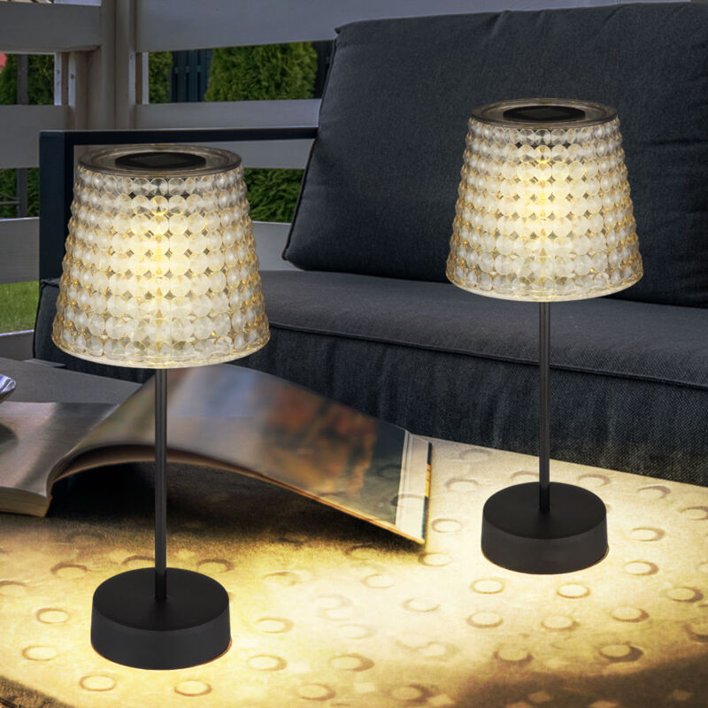 foto del prodotto lampada da tavolo a luce solare per esterni lampada da giardino a led in cristallo chiaro color fumo. plastica nera, batteria ip44, 3000k bianco