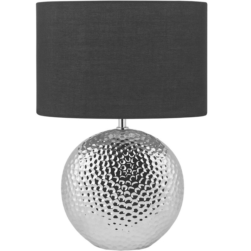 foto del prodotto lampada da tavolo in ceramica dorata 51 cm base intagliata lucida paralume rotondo moderno nasva