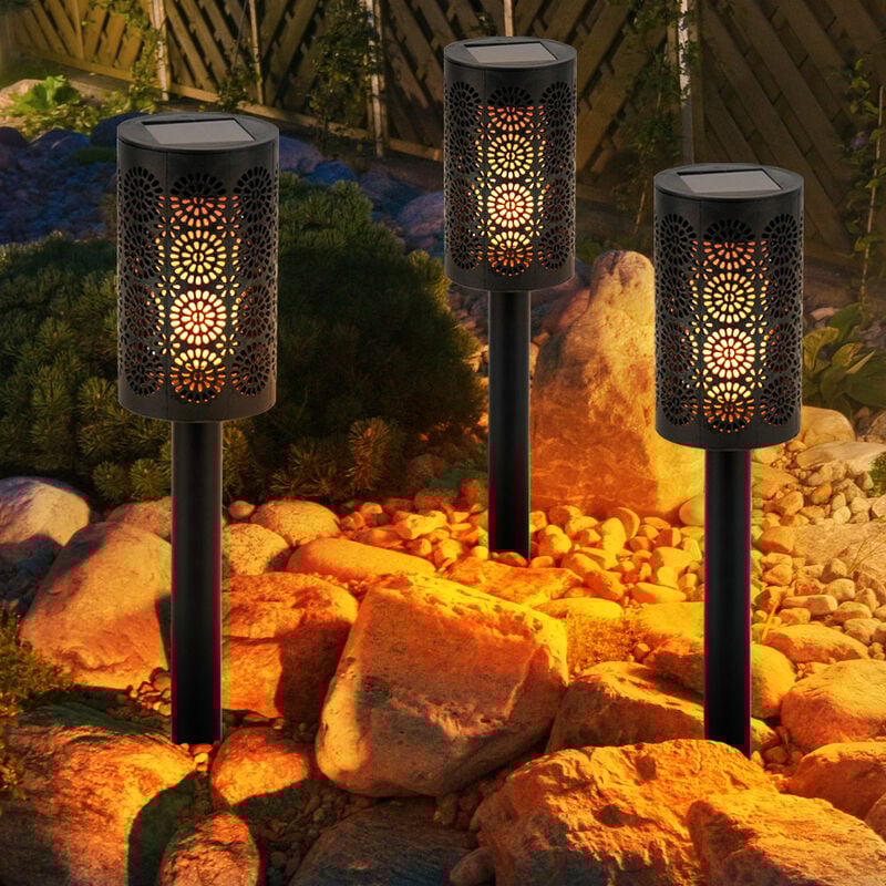 foto del prodotto lampada solare, lampada da giardino, lampada plug in, torcia con punzonature decorative, lampada da terrazza, batteria ricaricabile, effetto fuoco,