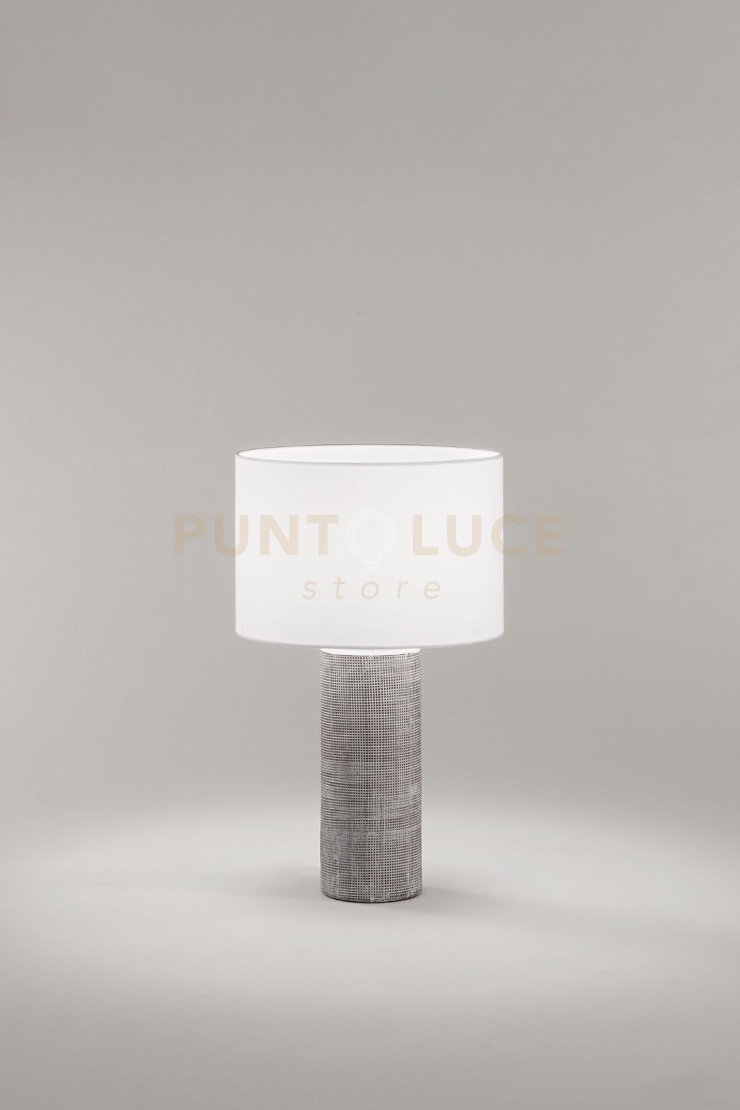 foto del prodotto lampada tribale da tavolo grigio cemento pralume in tessuto bianco attacco e27 d.32cm