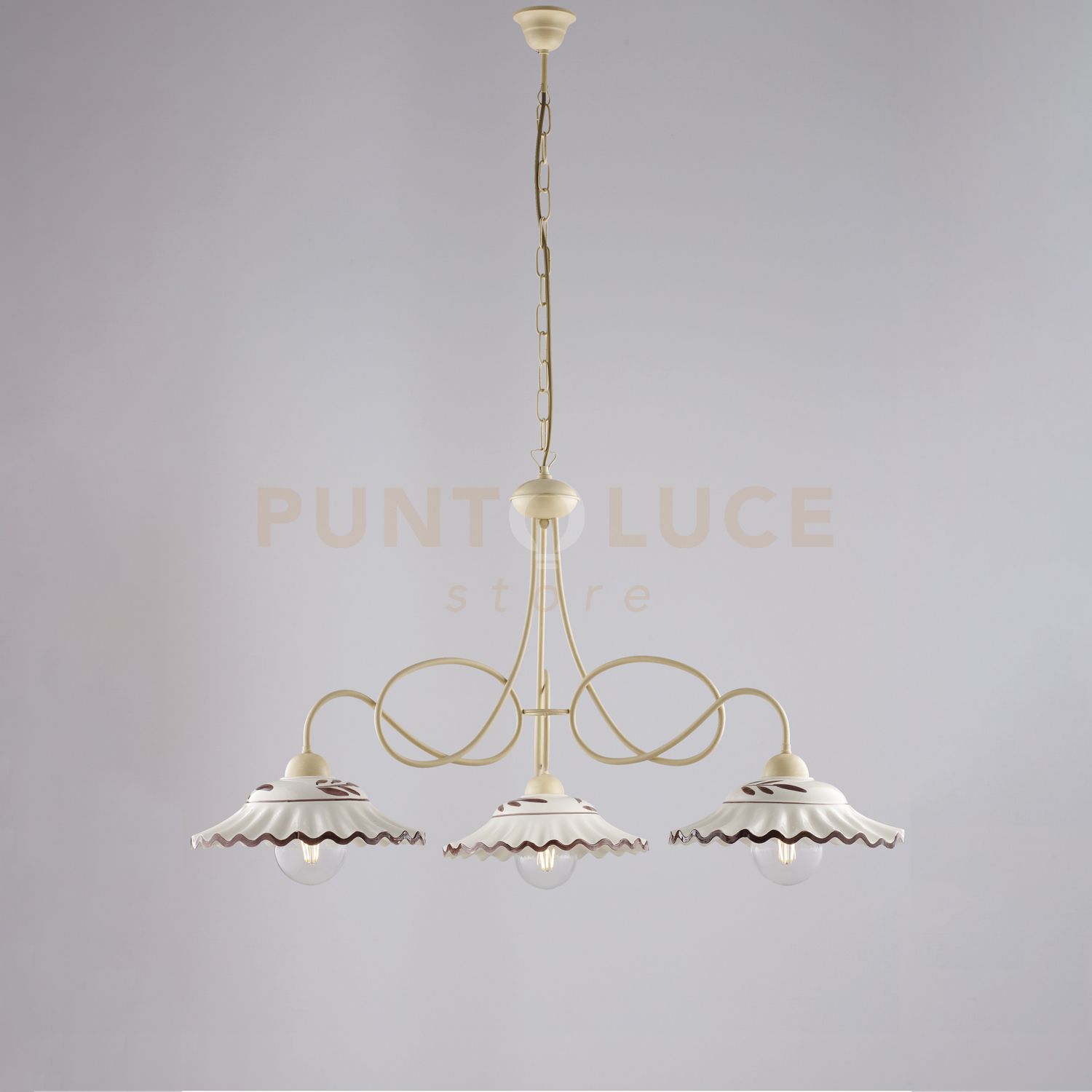 foto del prodotto lampadario in ferro laccato avorio e decorazione effetto decap con diffusori in ceramica diametro 30 bianco e marrone 3 luci