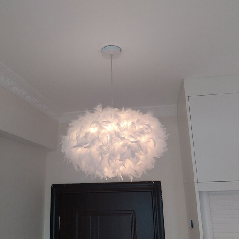 foto del prodotto lampade a sospensione ovale creativo con piume moderne lampada da soffitto da comodino base argento