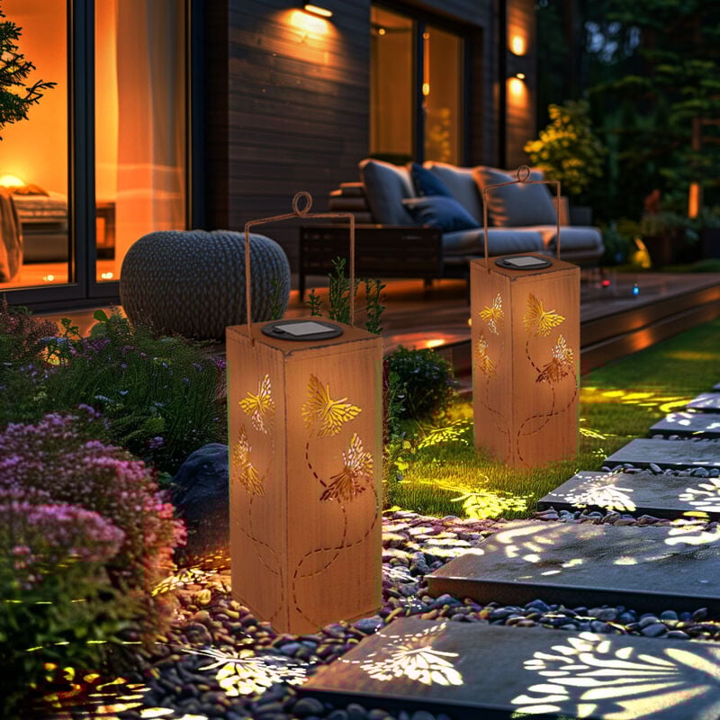 foto del prodotto lanterna decorativa da giardino a luce solare, lampada da giardino, lampada decorativa, lampada da esterno, punzonatura decorativa a farfalla,