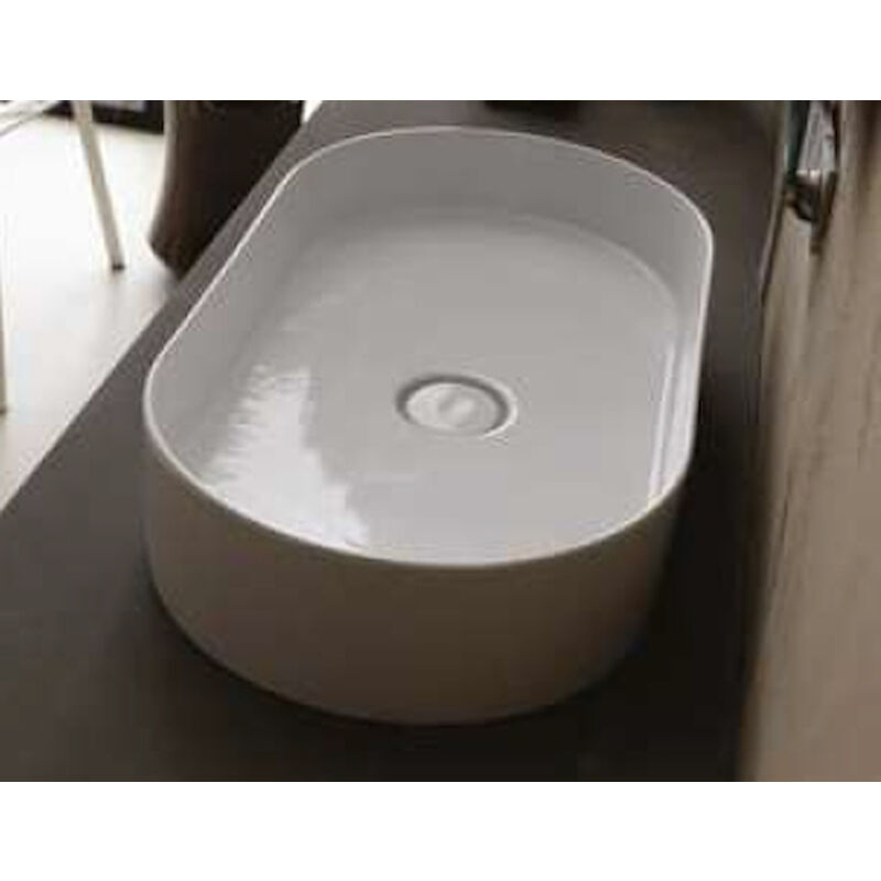 foto del prodotto lavabo in ceramica ovale 65x35 bco luc. da appoggio s troppieno codice prod dsv17439 scelto da desivero