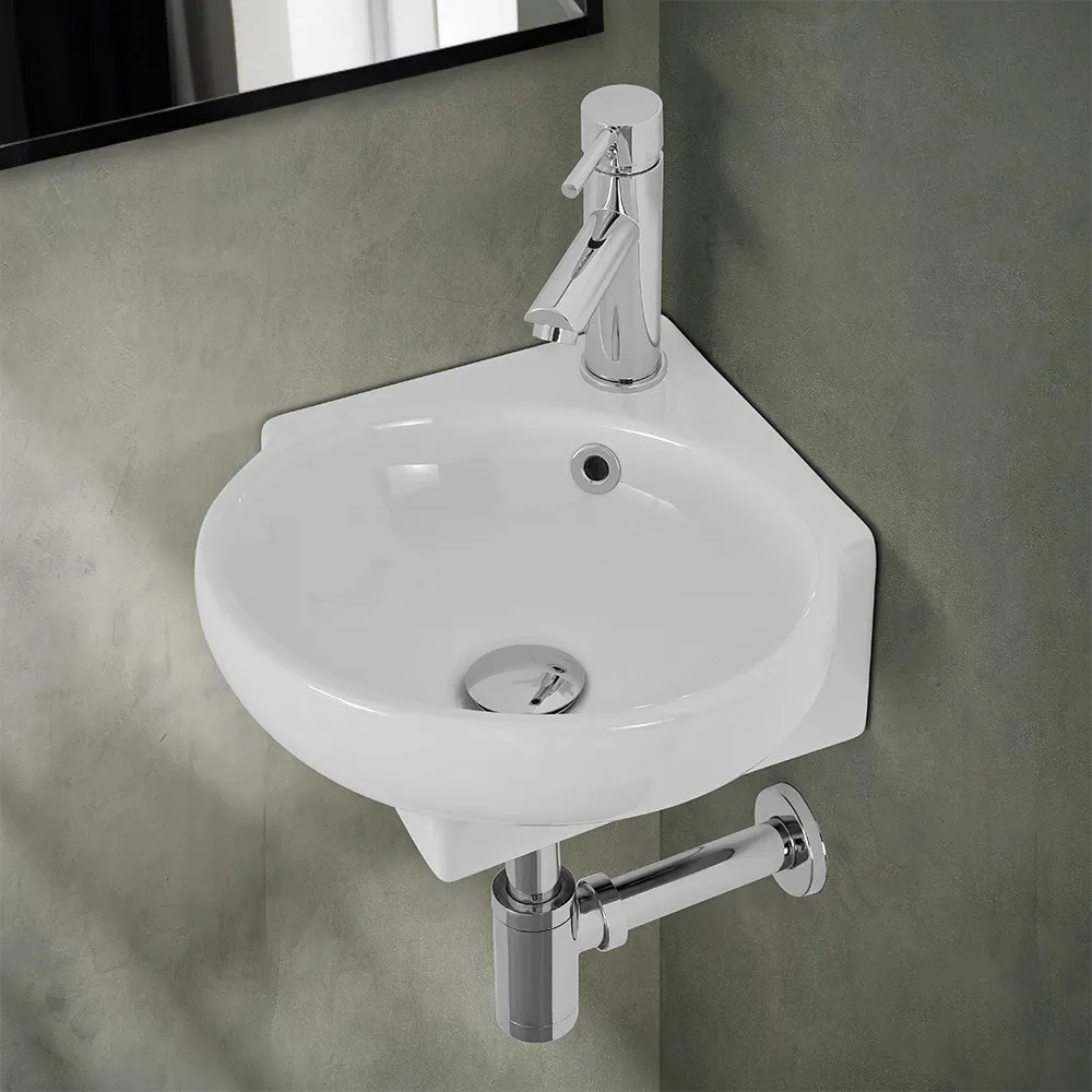 foto del prodotto lavabo sospeso ad angolo 39x36 in ceramica lucida con design ovale