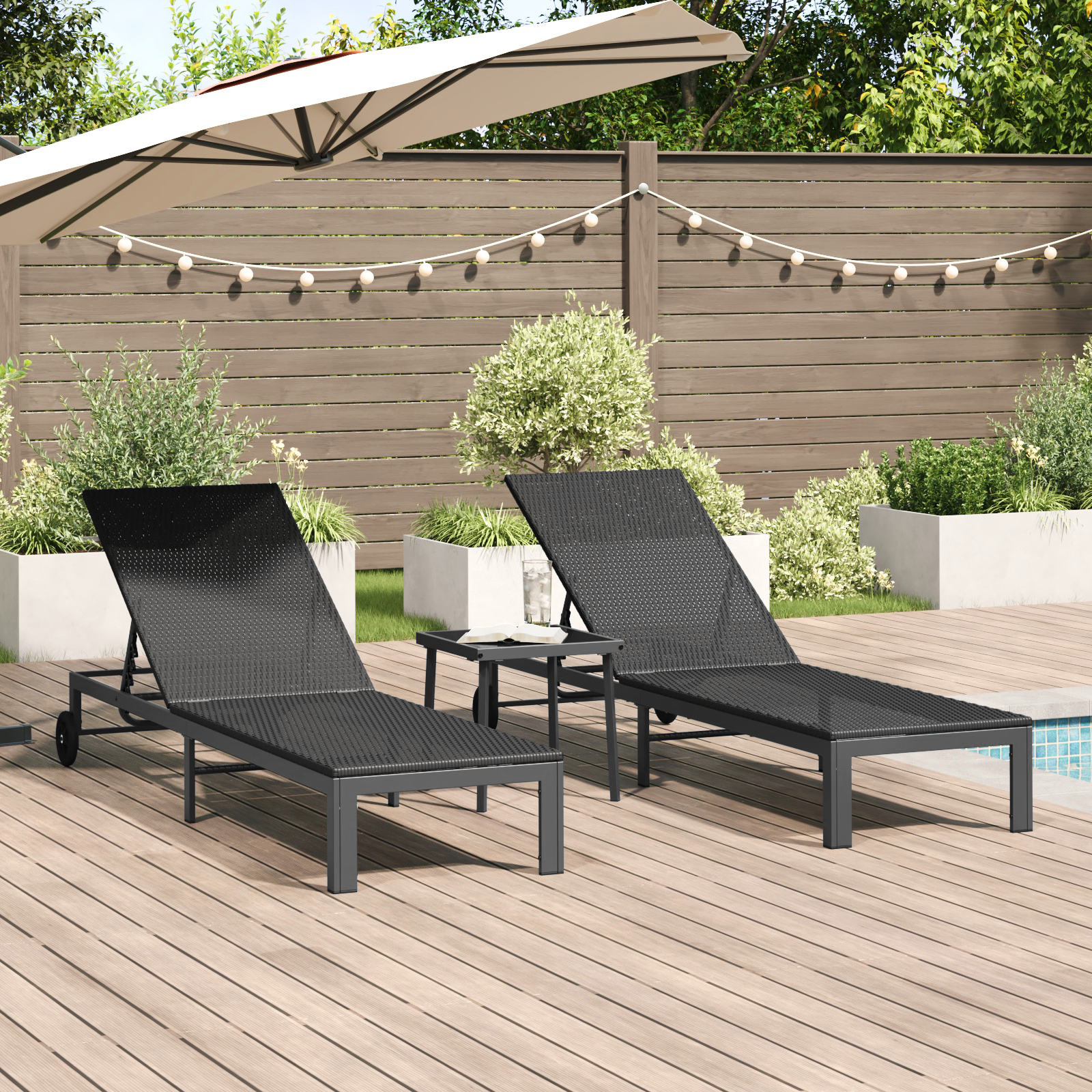 foto del prodotto lettini 2 pcs con ruote e tavolo nero polyrattan