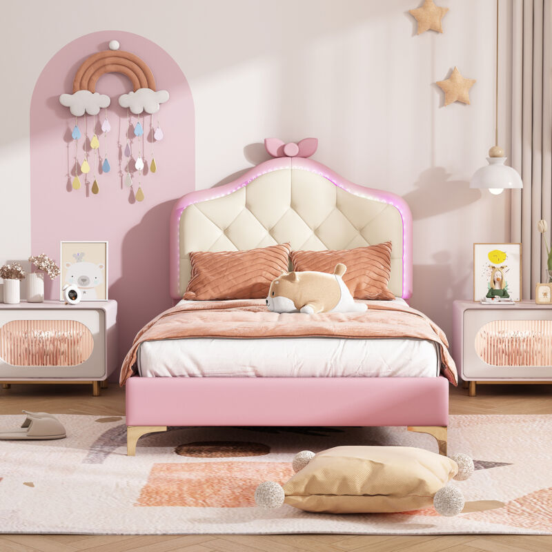foto del prodotto letto imbottito, letto singolo, forma ad onda con punto di trazione sulla testiera, fiocco rosa, con strisce led multicolori cangianti, letto per