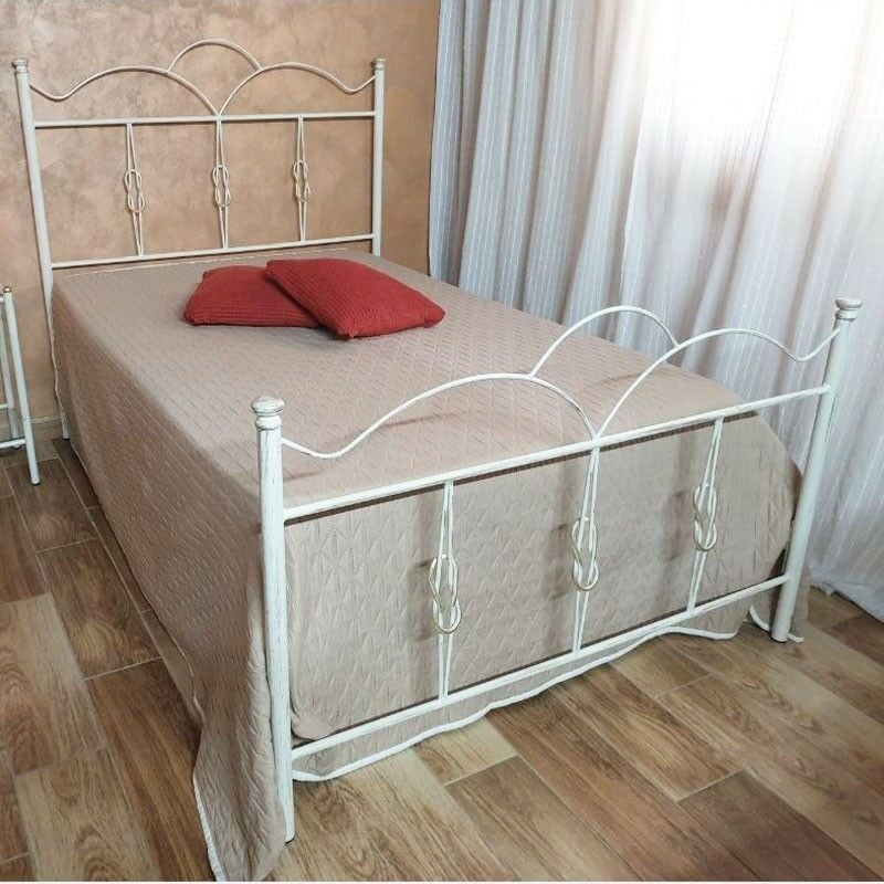 foto del prodotto letto una piazza e mezza in ferro battuto con pediera bianco oro primula 130x202x h127cm