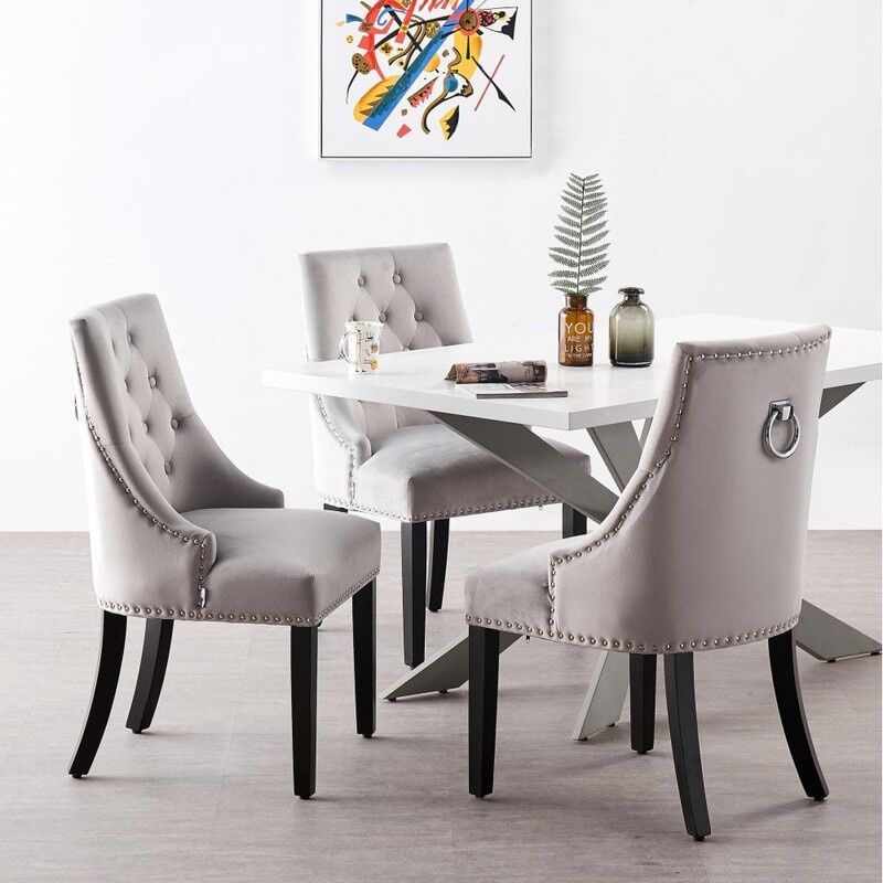 foto del prodotto life interiors - duke lux windsor dining set - un tavolo da pranzo in legno bianco e un set di 6 sedie da pranzo in velluto grigio chiaro - sala da