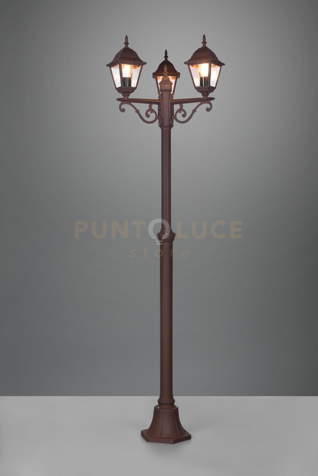 foto del prodotto livenza palo alto 3 lanterne da esterno 4 lati fusione di alluminio ruggine e vetro trasparente h. 200cm ip44 attacco e27