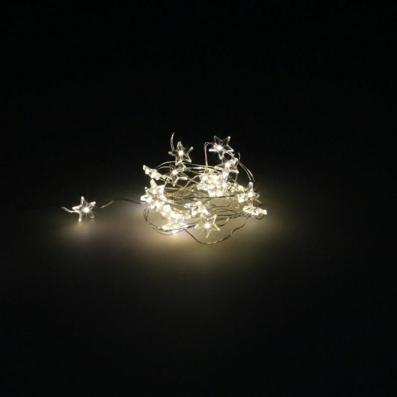 foto del prodotto luci di natale stelle 20 led colore bianco caldo ip44. funzionamento a batteria 3 aa non incluse 