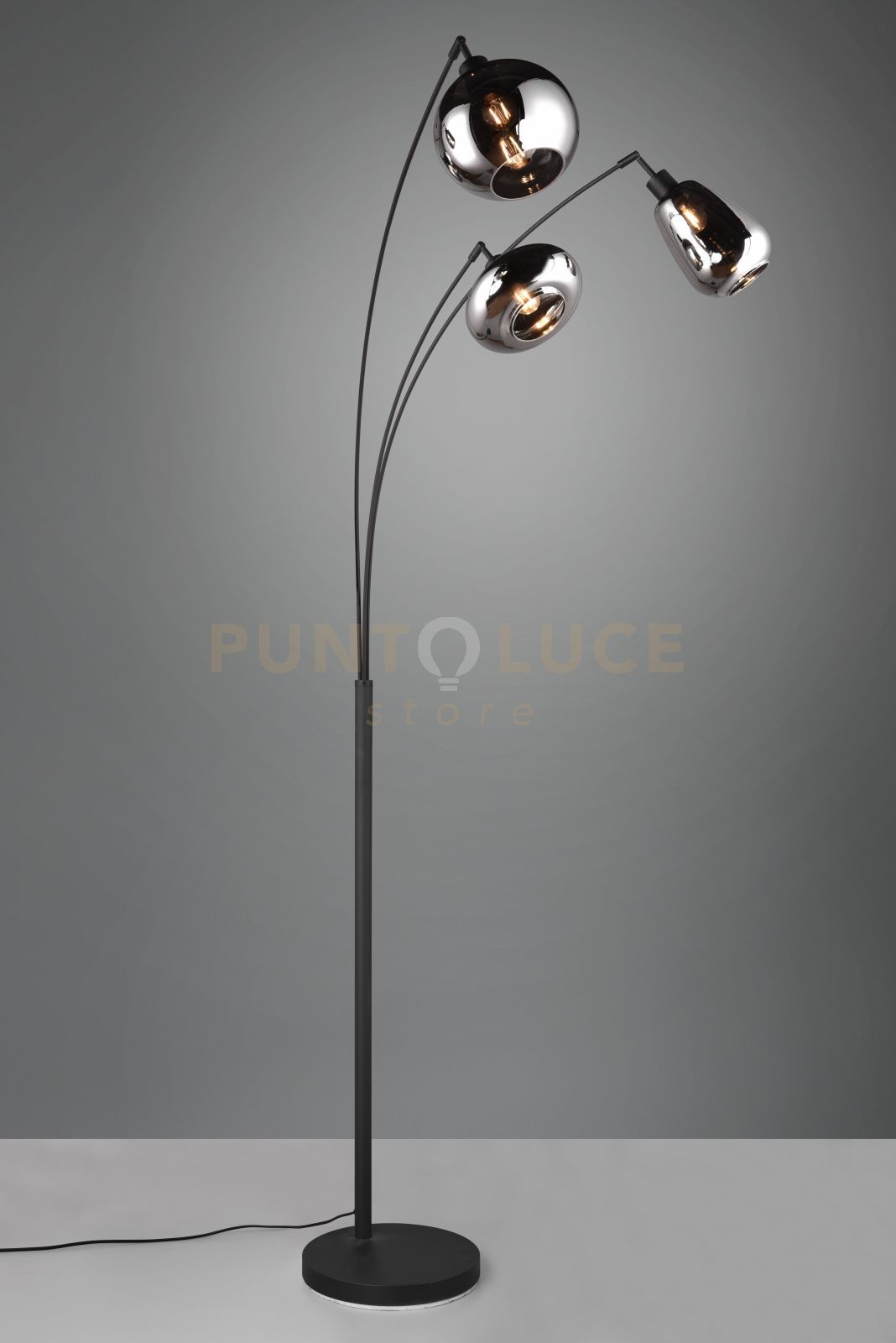foto del prodotto lumina piantana metallo nero ad arco con 3 diffusori forme differenti in vetro cromo fume h. 200cm attacco e14