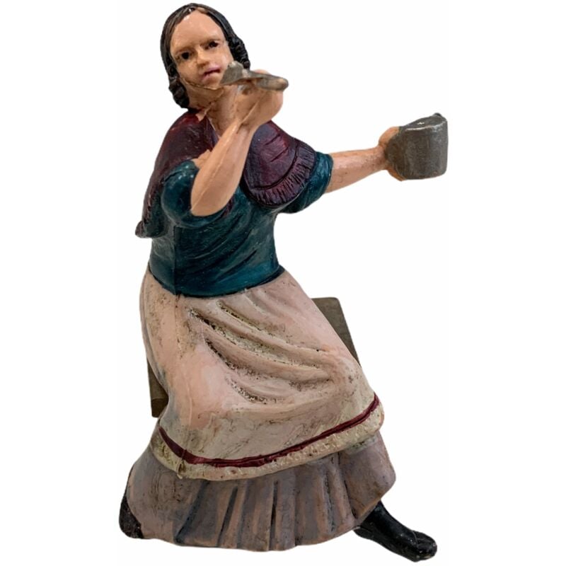 foto del prodotto magiedinatale statuetta per presepe natalizio donna che mangia con una posata ed un piatto h 10 cm