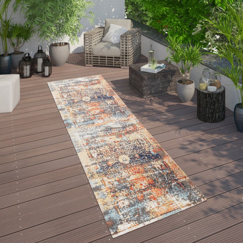foto del prodotto moderno tappeto per interni ed esterni con design nomade, per terrazzi, resistente alle intemperie, colorato 60x100 cm paco home
