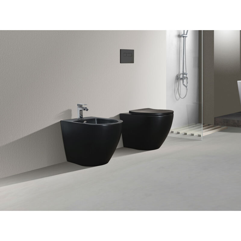 foto del prodotto nala set sanitari a terra filo muro senza brida rimless, linea tonda colore nero opaco coprivaso soft close